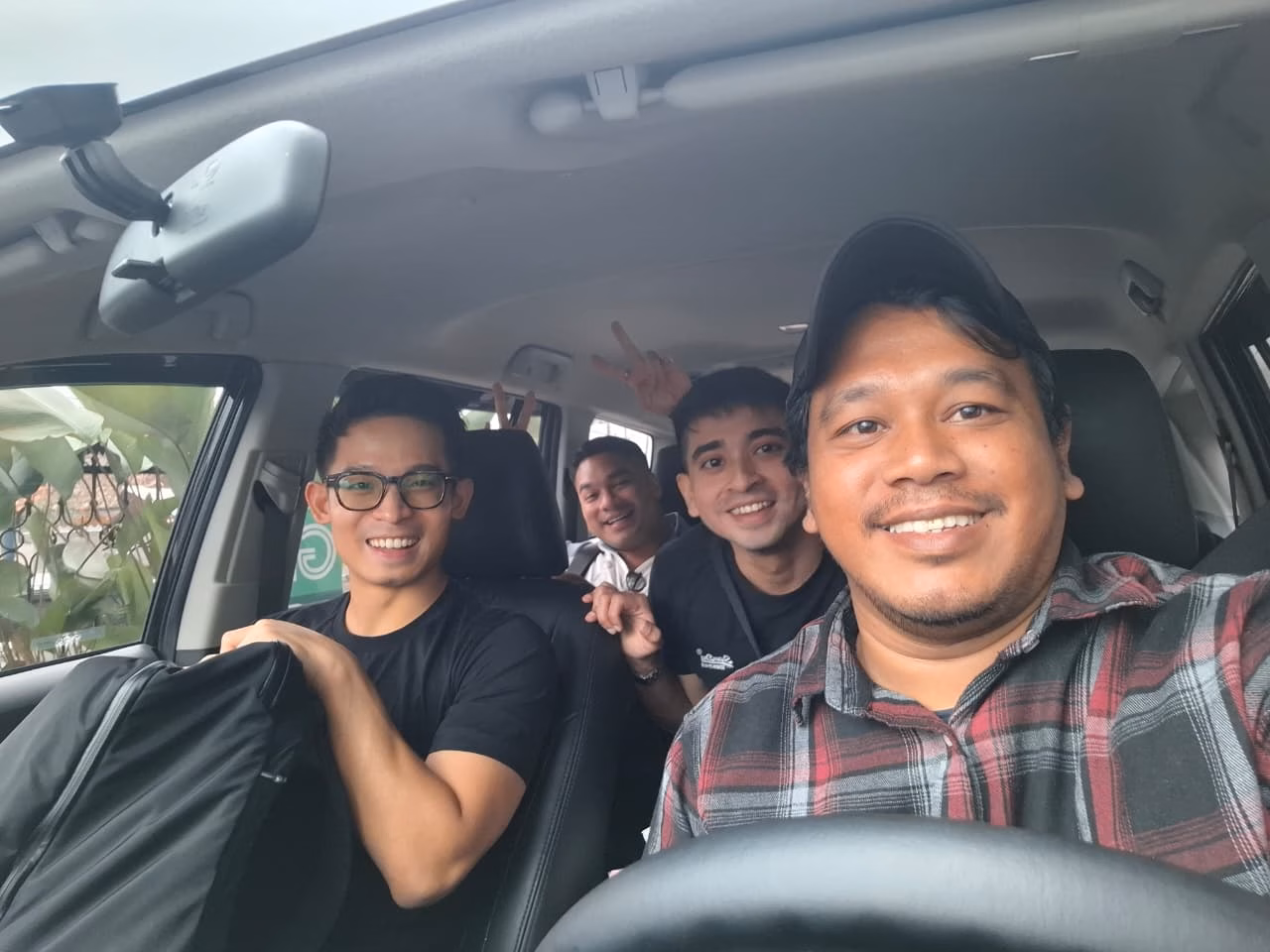 Guests travelling in their own car with a hired driver in Bandung