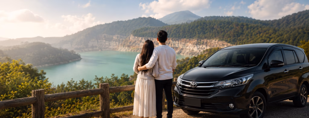 Couple enjoying a romantic Bandung honeymoon trip with a private driver near a scenic lake and mountain view