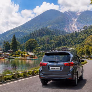 Private car driving from Bandung to Lembang with mountain and lakeside scenery